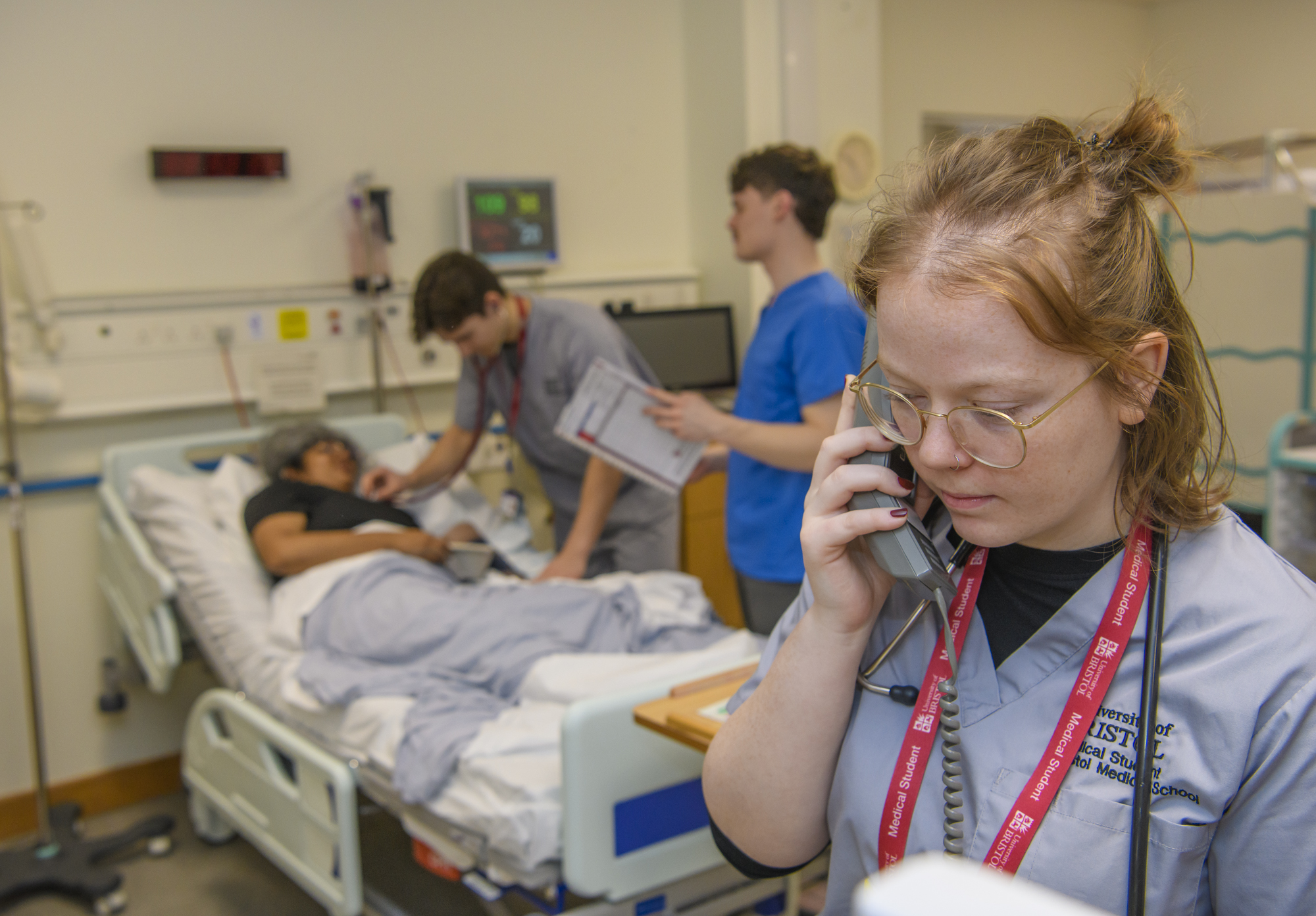 Students working in medical simulation suite