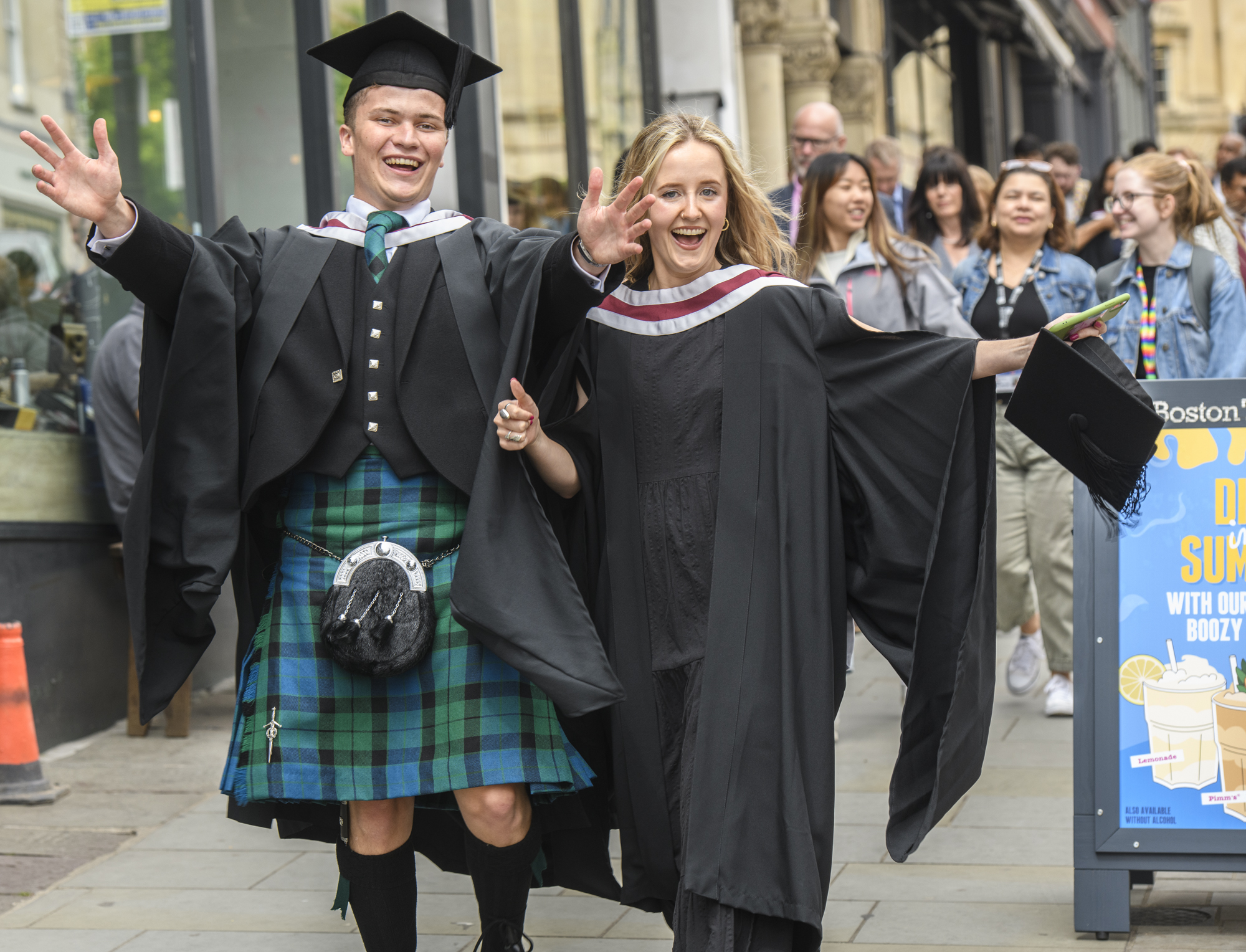 Newly graduated doctors in streets of Bristol