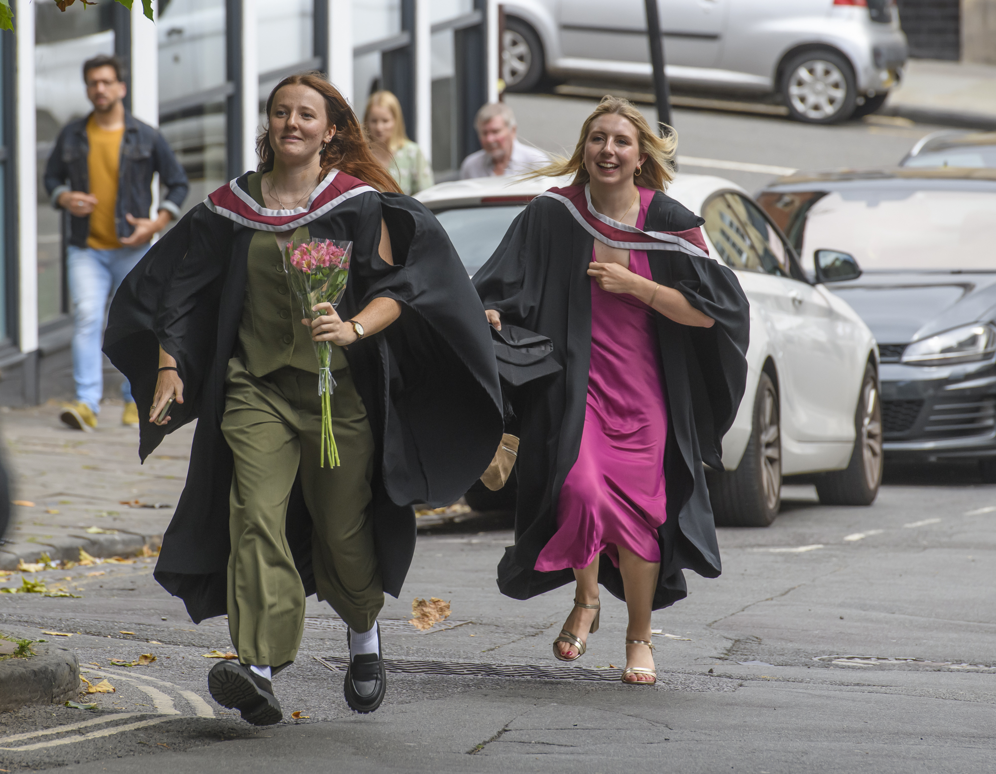 Newly graduated doctors in streets of Bristol